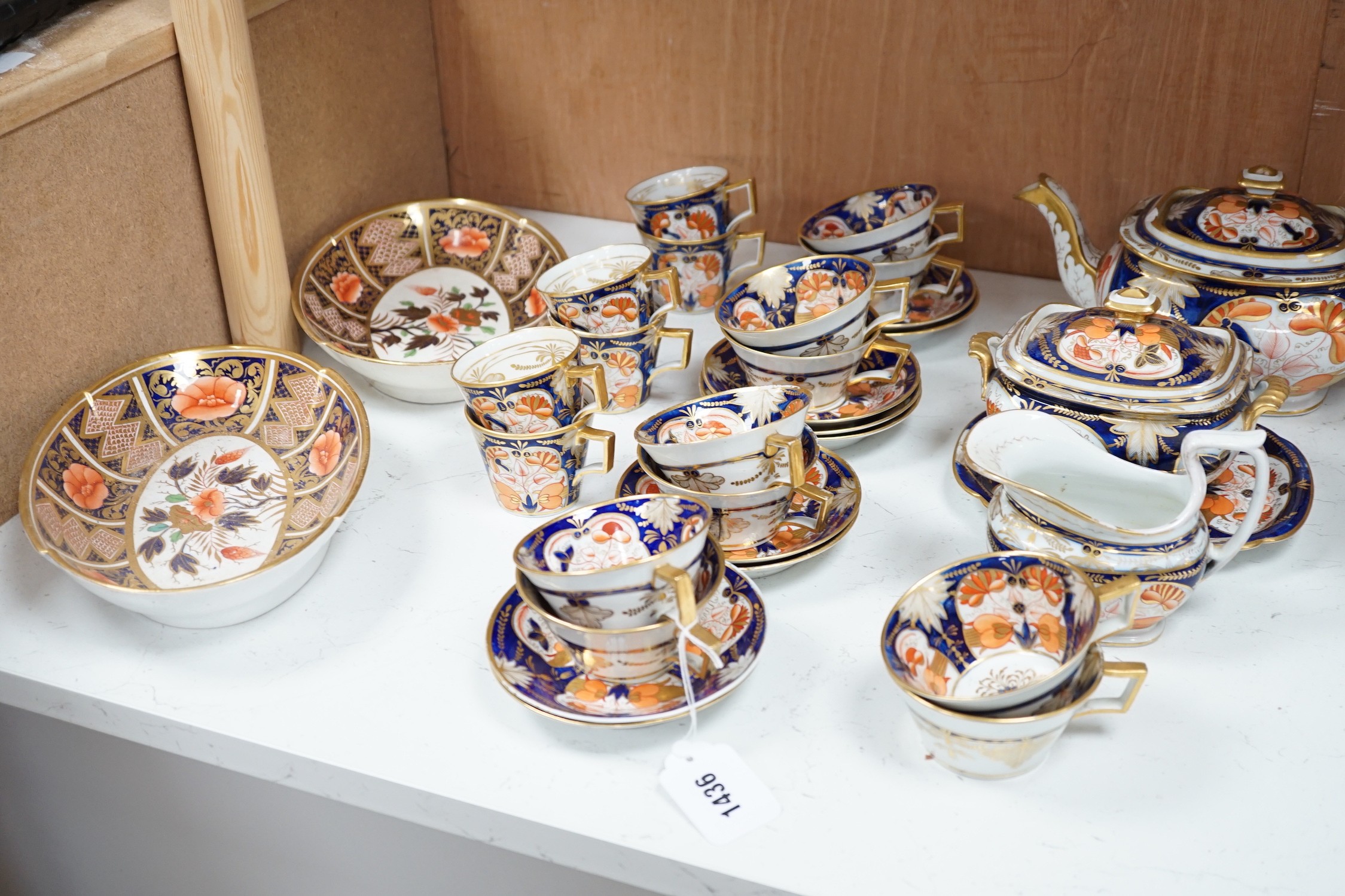 An early 19th century English porcelain Japan-pattern tea and coffee set and two similar dessert dishes